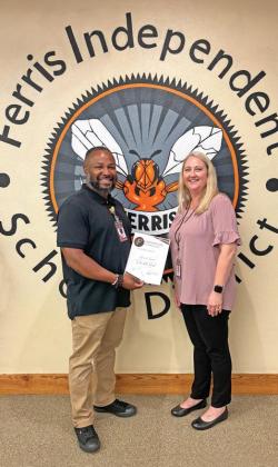 Longino Teacher of the Month Hewitt Hunt pictured with Longino Principal Christy Murphy.