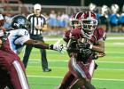 Sophomore running back Kingston McAdams (15) was bottled up by the Seguin defense for most of the night, managing only 66 yards on 11 carries. Photo by Fred Phipps.